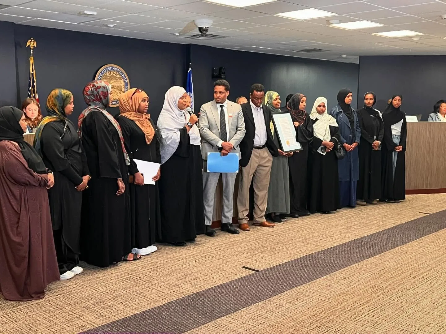 Community members at a summit panel discussion.