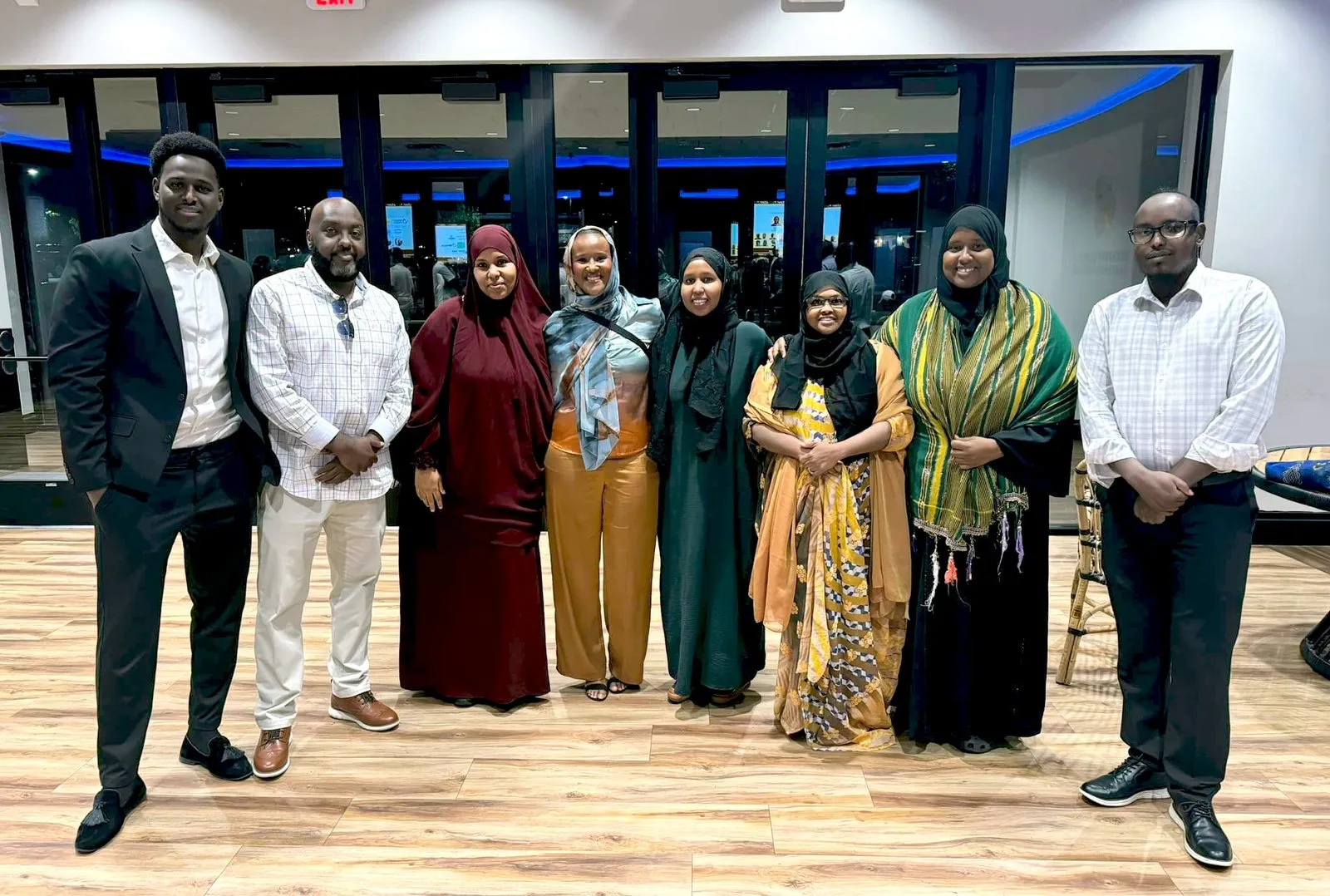 Maangaar Voices team members standing together at the summit.