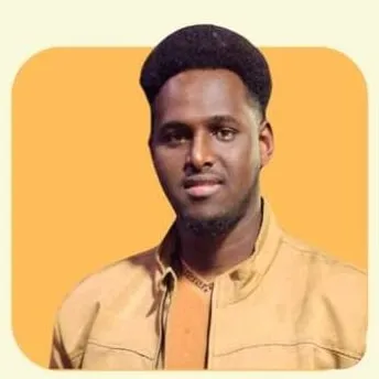 Portrait of Abwaan Mohamed Eid in a tan jacket, from the 2024 Presentations flyer.